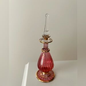 Elegant Pink and Gold Glass Perfume Bottle